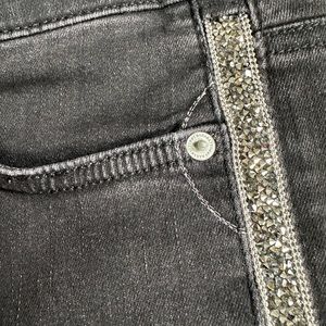 Black jeans with side tape sparkles